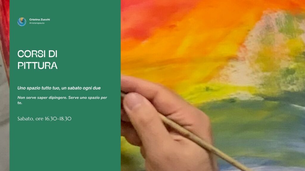 Corsi di pittura del sabato a Padova: mano che dipinge un paesaggio dai colori accesi
